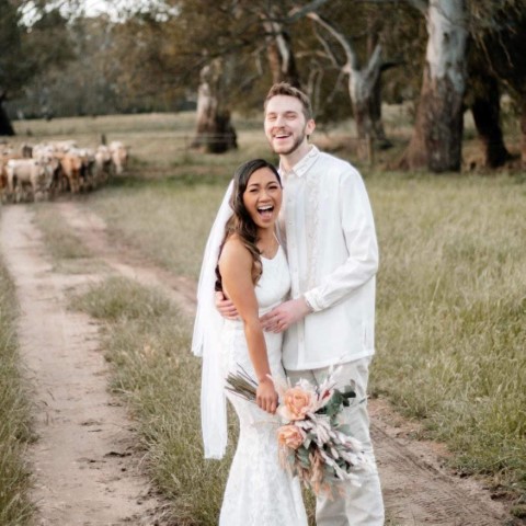 Happy Couple laughing on their wedding day